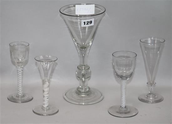 Three opaque twist cordial glasses and a large trumpet glass tallest 23.5cm